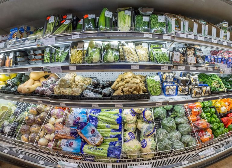 The Psychology of the Weekly Grocery Budget Shelves of fresh produce inside a supermarket, where weekly budgets are won or lost